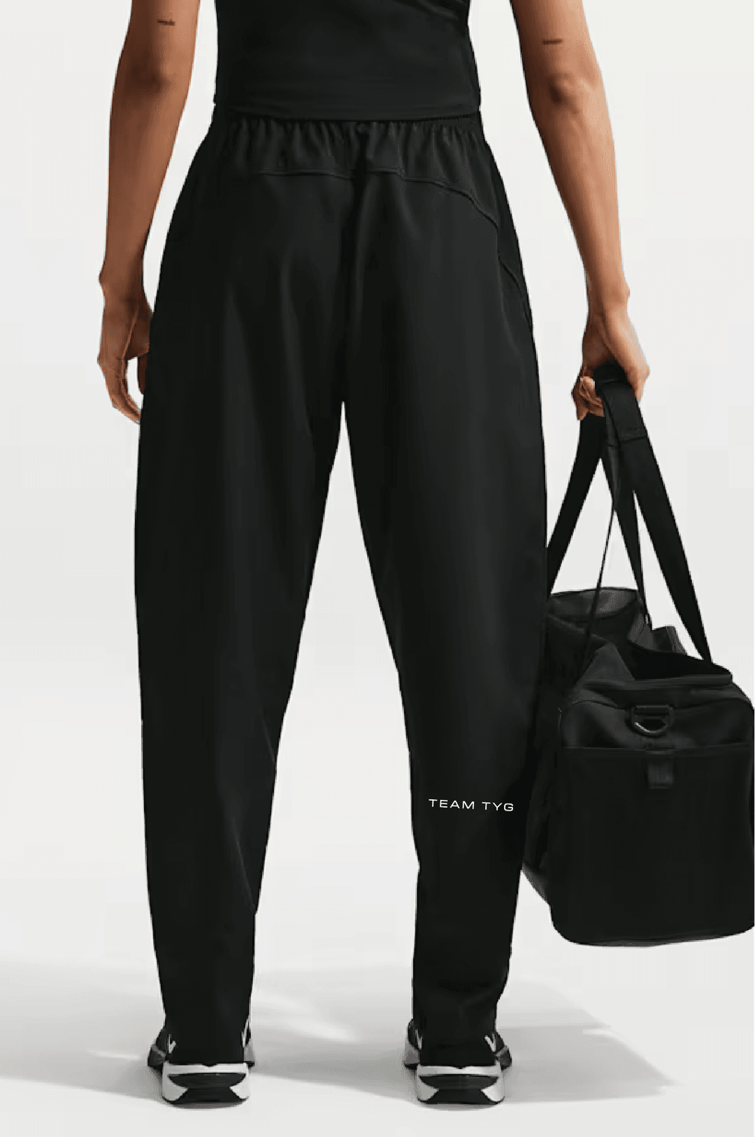 Nike One Women's Dri-FIT Mid-Rise Woven Pants - Black